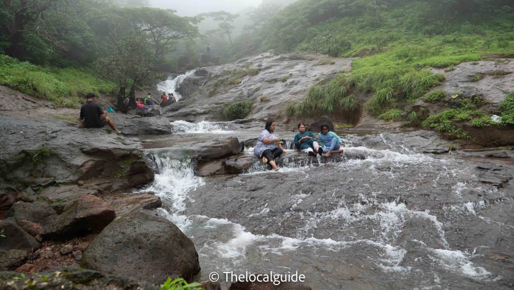 people enjoying in kondeshwar waterfall-kondeshwar mandir-Thelocalguide